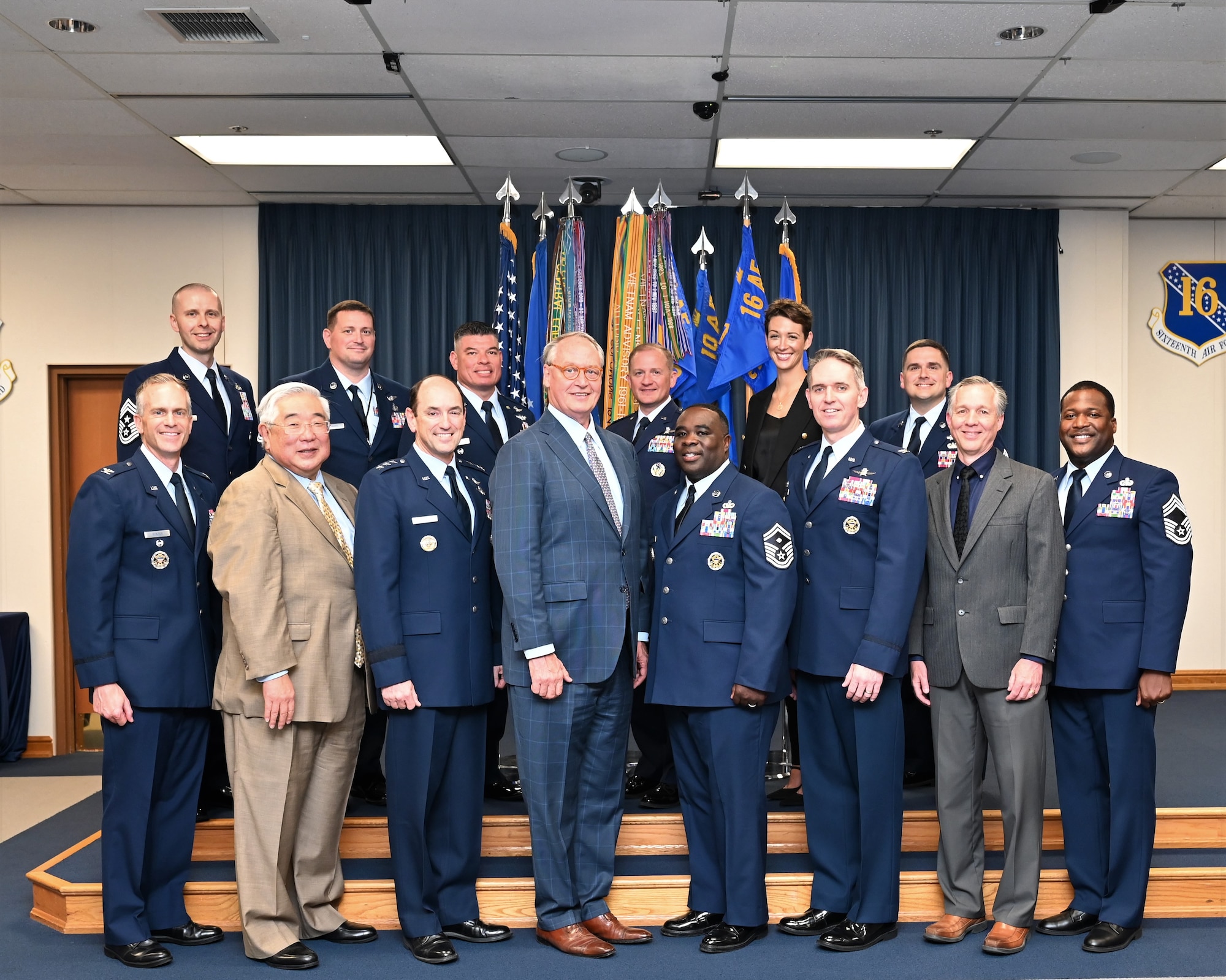 Sixteenth Air Force (Air Forces Cyber) leadership and their respective ‘honorary commanders’ pose for photo after the 16th Air Force Civic Leader Induction Ceremony April 1, 2024, at the Bernard A. Larger Auditorium, Joint Base San Antonio-Lackland, Texas. The civic leader program connects community leaders from the local San Antonio area with 16th Air Force unit leadership who engage, educate, and empower civic leaders (honorary commanders) as unofficial spokespersons who provide ideas and feedback to commanders as to how Air Force missions can be best accomplished. (Air Force photo by Deirdre McNamara)