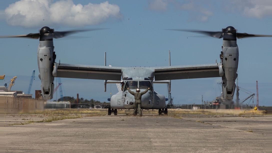 U.S. Marines with Medium Tiltrotor Squadron (VMM) 268, Marine Aircraft Group 24, 1st Marine Aircraft Wing, land a MV-22B Osprey in preparation for Marine Rotational Force Darwin (MRF-D) at Joint Base Pearl Harbor-Hickam, Hawaii, April 16, 2024. MRF-D is a deployment held in Australia that enhances capabilities and readiness of both the United States Marine Corps and the Australian Defense Force and continues to help strengthen the alliance between the two nations. VMM-268 will serve as the Aviation Combat Element for the upcoming iteration of MRF-D. (U.S. Marine Corps photo by Lance Cpl. Matthew Benfield)