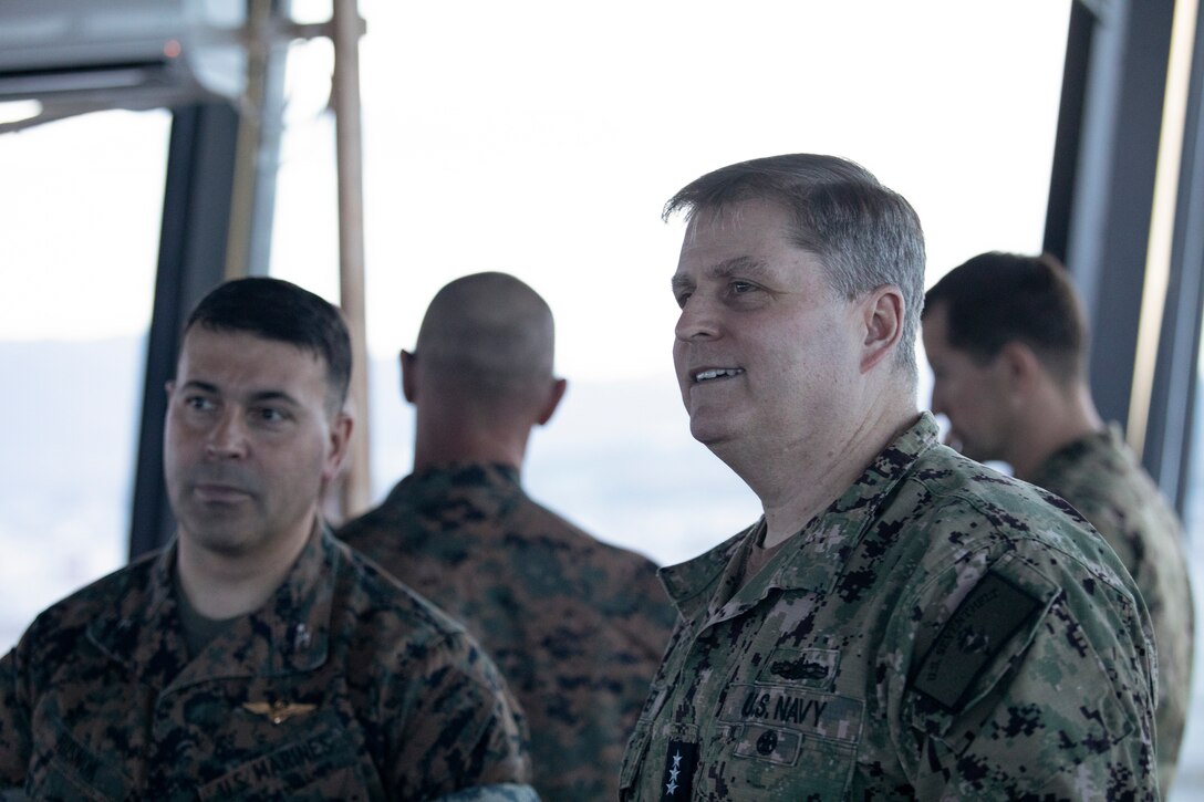 U.S. Marine Corps Col. Richard Rusnok, left, a native of Pennsylvania, the commanding officer of Marine Corps Air Station Iwakuni, speaks with U.S. Navy Vice Adm. Fred Kacher, a native of Virginia, the commander of the U.S. 7th Fleet, during an installation tour at MCAS Iwakuni, Japan, April 11, 2024. The U.S. 7th Fleet commander visited MCAS Iwakuni to observe capabilities and readiness while giving service members and base personnel the opportunity to speak with him about varying topics. (U.S. Marine Corps photo by Lance Cpl. Micah Taylor)