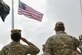 An Airman and a Guardian render a salute during the singing of the National Anthem at the 9/11 Patriot Day ceremony held at Buckley Space Force Base, Colo., Sept. 11, 2023. During the ceremony, members from Buckley SFB honored the lives of those lost and the courage and bravery of the first responders who tirelessly worked to save lives.