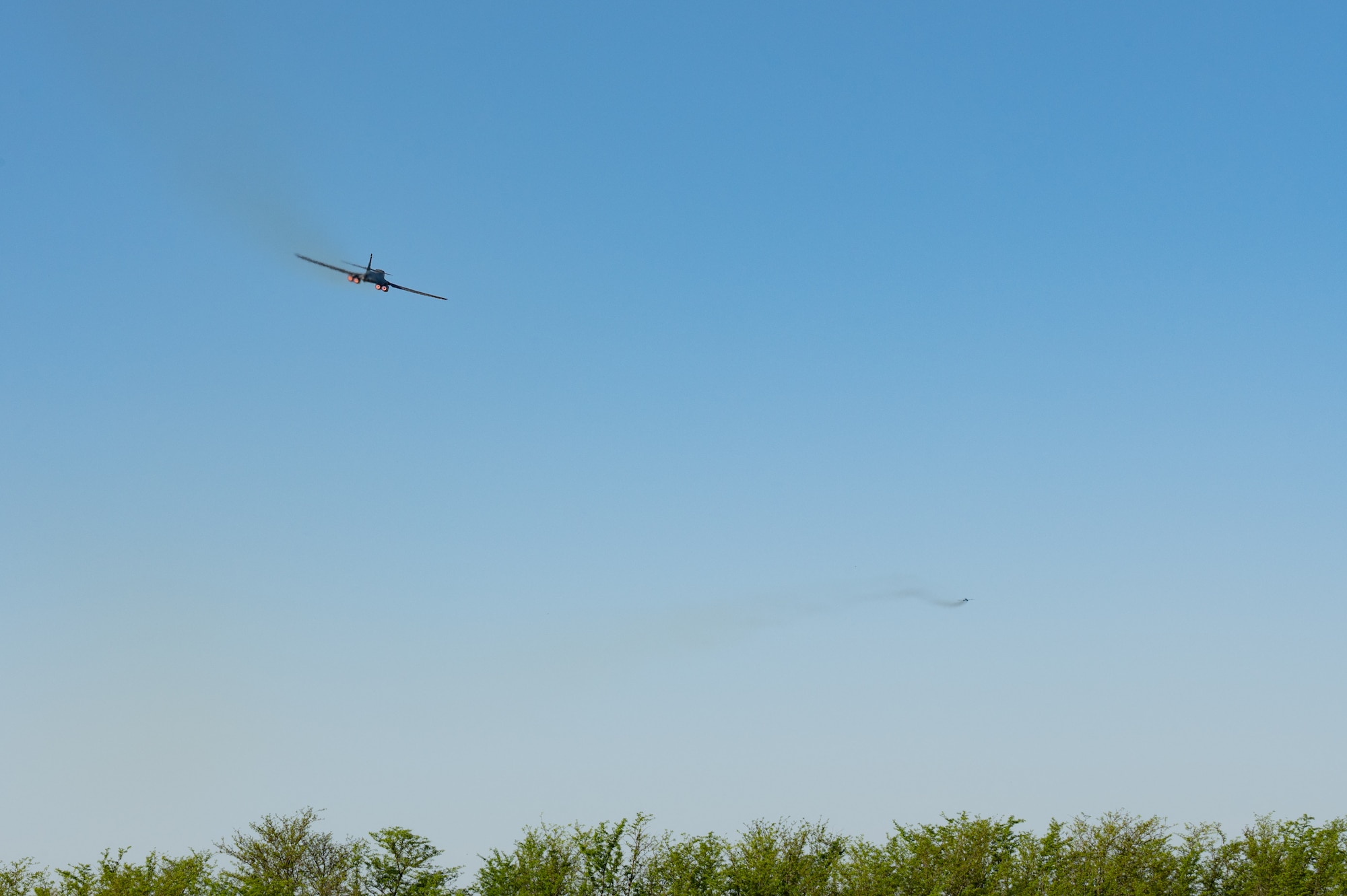 Two U.S. Air Force B-1B Lancers fly away