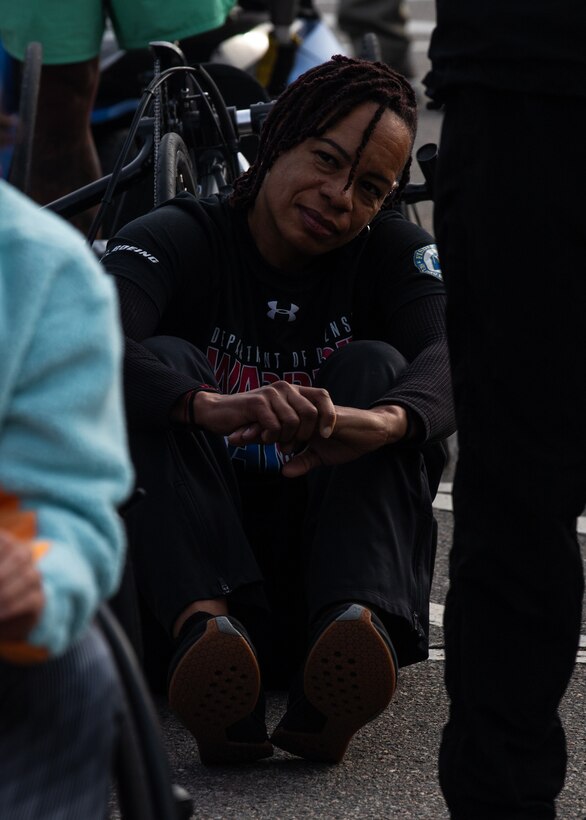 U.S. Army veteran Sgt. 1st Class Lavone Kendrick listens to a briefing during the cycling event at the 2024 Army Trials, Fort Liberty, North Carolina
