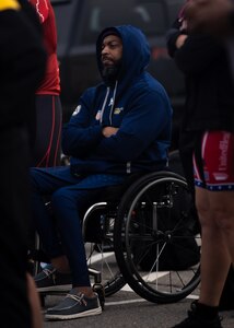 U.S. Army veteran Spc. Brent Garlic listens to a briefing during the cycling event at the 2024 Army Trials, Fort Liberty, North Carolina