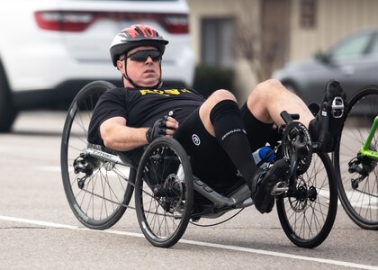 U.S. Army veteran Chief Warrant Officer 5 Richard McCormick rides a recumbent cycle during the cycling event at the 2024 Army Trials, Fort Liberty, North Carolina