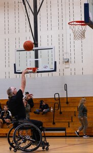 U.S. Army Chief Warrant Officer 3 Kirk Holden takes a shot during the wheelchair basketball event at the 2024 Army Trials, Fort Liberty, North Carolina