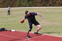 U.S. Army veteran Cpl. Patrick Dayton is preparing to throw the discus during the field event at the Army Trials, Fort Liberty, North Carolina