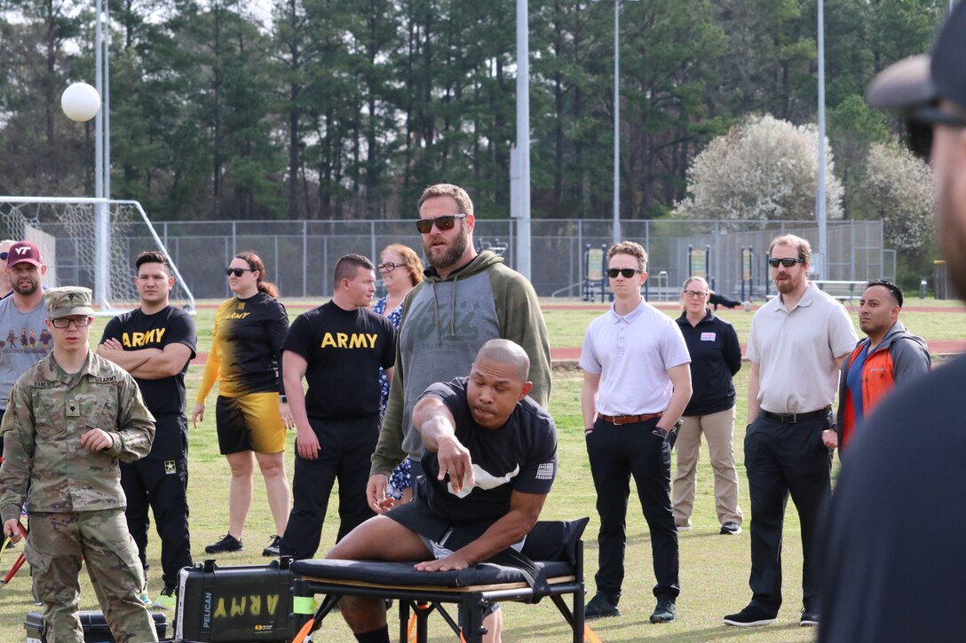U.S. Army veteran Staff Sgt. Gene Calantoc is in form throwing the shot put during the field event at the Army Trials, Fort Liberty, North Carolina