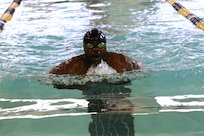 U.S. Army Spc. Darnell Boynton cruises into the first turn during the swimming event at the Army Trials, Fort Liberty, North Carolina