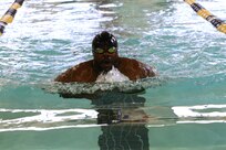 U.S. Army Spc. Darnell Boynton cruises into the first turn during the swimming event at the Army Trials, Fort Liberty, North Carolina