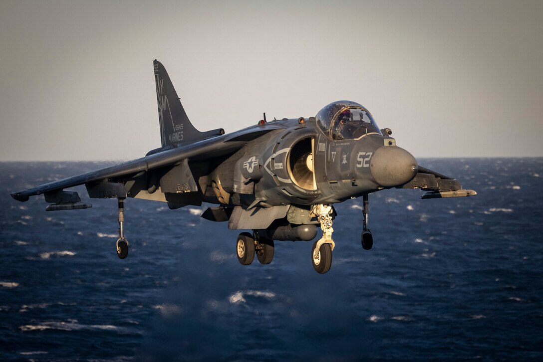 A U.S. Marine Corps AV-8B Harrier with Marine Medium Tiltrotor Squadron 365 (Reinforced), 24th Marine Expeditionary Unit (MEU), prepares to land aboard the USS Wasp (LHD 1) while underway in the Atlantic Ocean, April 12, 2024. The USS Wasp, with embarked 24th MEU, is underway in the Atlantic Ocean completing integrated naval training as a Wasp Amphibious Ready Group-24th MEU team. (U.S. Marine Corps photo by Lance Cpl. John Allen)