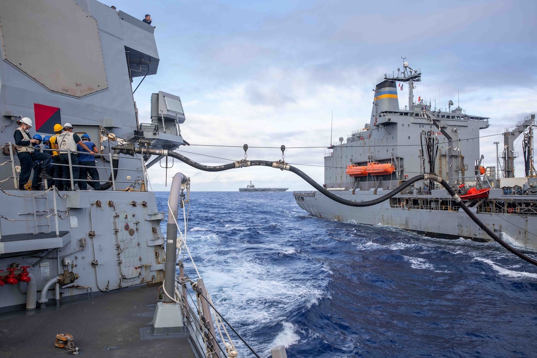 USS Russell (DDG 59), left, refuels from USNS John Ericsson (T-AO 194).