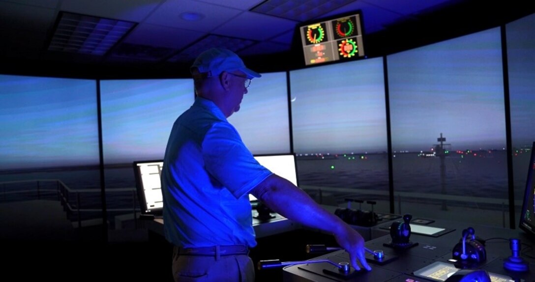 Researchers from ERDC along with the Association of Maryland Pilots run virtual simulation tests on a bypass channel around the Francis Scott Key Bridge accident site using the Ship/Tow Simulator located at ERDC’s Coastal and Hydraulics Laboratory in Vicksburg, Miss., April 12, 2024.