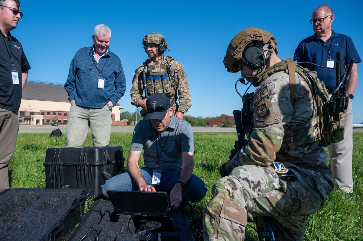 621st Contingency Response Group Airmen talk with DoD and industry partners during a demonstration for the 2024 Spring Industry Preview at Scott Air Force Base, Illinois. During the SIP, nearly 400 DoD and Industry partners came together to solve operational challenges like distributed command and control, exploding into theater and decreased ground time during operations. (U.S. Air Force photo by TSgt Zachary Boyer)