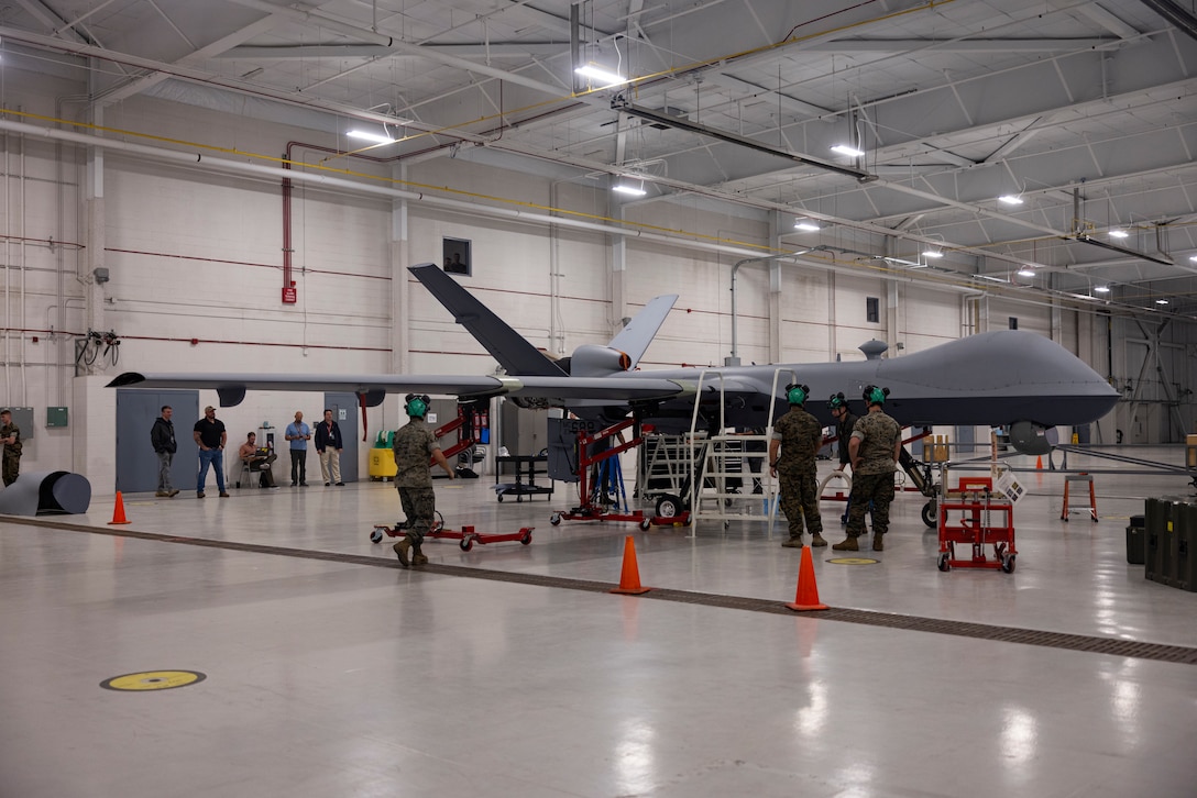 U.S. Marines with Marine Unmanned Aerial Vehicle Training Squadron (VMUT) 2 conduct familiarization training with an MQ-9A Reaper unmanned aircraft at Marine Corps Air Station Cherry Point, North Carolina, April 11, 2024. Marines with VMUT-2 worked alongside civilian contractors to conduct familiarization training with VMUT-2’s first delivered and assembled MQ-9A Reaper unmanned aircraft. VMUT-2 will serve as the Marine Corps MQ-9A Reaper Fleet Replacement Squadron, whose primary mission is to train 7318 unmanned aerial systems officers and 8022 enlisted sensor operators. (U.S. Marine Corps photo by Lance Cpl. Orlanys Diaz Figueroa)