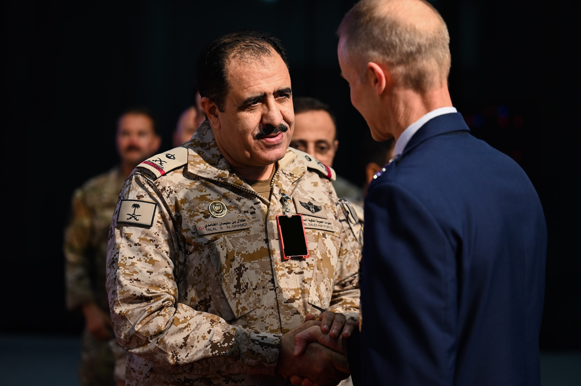 Royal Saudi Air Force Maj. Gen Pilot Talal Sulaiman Al-Ghamdi (left), Deputy Commander of the RSAF, congratulates U.S. Air Force Lt. Gen. Derek France, the new Ninth Air Force (Air Forces Central) commander, following his change of command ceremony at Al Udeid Air Base, Qatar, April 18, 2024. AFCENT is a high performing, innovative team, executing an integrated campaign alongside regional and Coalition nations to deter and, if necessary, defeat regional aggressors and global competitors. (U.S. Air Force photo)