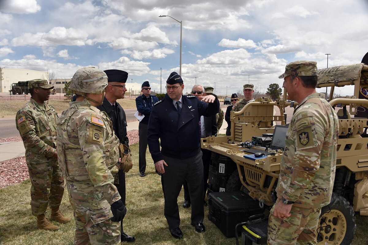 Sgt. Jesse De La Torre, 1st Space Brigade, U.S. Army Space and Missile Defense Command, briefs Chief of Space Operations U.S. Space Force Gen. Chance Saltzman and Chief Master Sgt. of the Space Force John F. Bentivegna on a tactical space control system during a visit to the brigade headquarters at Fort Carson, Colo., April 10. (U.S. Army photo by Dottie White)