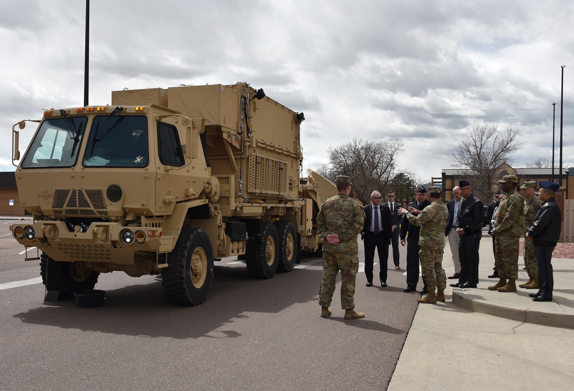Col. Mark Cobos, commander, 1st Space Brigade, U.S. Army Space and Missile Defense Command, discusses Army space capabilities with Chief of Space Operations U.S. Space Force Gen. Chance Saltzman and Chief Master Sgt. of the Space Force John F. Bentivegna during a visit to the brigade headquarters at Fort Carson, Colorado, April 10. (U.S. Army photo by Dottie White)
