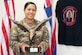 U.S. Air Force Maj. Allison Delos Santos, 154th Security Forces Squadron commander, showcases the 2023 Air National Guard Security Forces Outstanding Air Reserve Component Unit Award, April 6, 2024 at Joint Base Pearl Harbor-Hickam, Hawaii. The 154th Wing Security Forces Squadron was awarded the 2023 Air National Guard Security Forces Outstanding Security Forces Unit of the Year. (U.S. Air National Guard photo by Airman 1st Class Roann Gatdula)