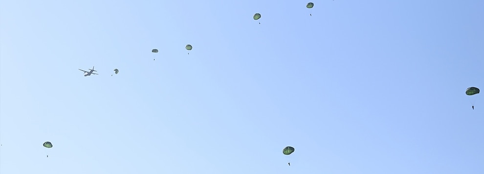 240418-F-XJ860-2390 OSAN AIR BASE, South Korea (April 18, 2024) A Republic of Korea CASA 235 deploys special operations forces during a static-line parachute jump over Osan Air Base, Republic of Korea, April 18, 2024. Approximately 200 U.S. and Republic of Korea special operations forces personnel participated in a static-line Airborne training operation as part of Korea Flying Training 24, a combined ROK and U.S. exercise running April 12-26. (U.S. Air Force photo by Master Sgt. Eric Burks)