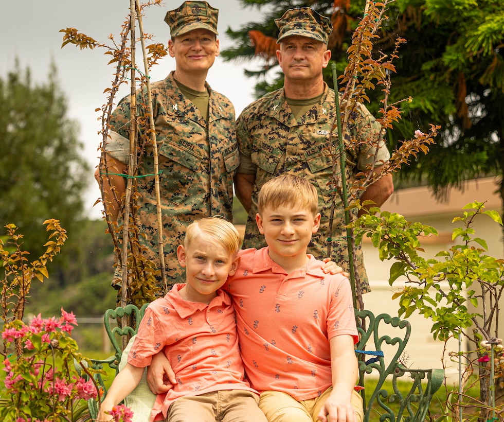 Col. Patrick Seipel and Col. Petra Seipel, both senior officers in charge of supply and logistics at the 1st Marine Aircraft Wing and the 3rd Marine Expeditionary Brigade, pose with their sons, Harley and Max, on Camp Courtney, Okinawa, Japan, April 13, 2024. The Month of the Military Child, celebrated annually in April, recognizes military children for the daily sacrifices and challenges they overcome. (U.S. Marine Corps photo by 1st Lt. Samuel H. Barge)