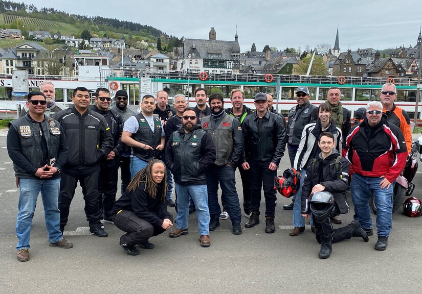 The entire group of motorcycle riders who participated in the U.S. Army Garrison Rheinland-Pfalz Drive Safe Campaign motorcycle safety ride April 11 pose for a photo along the Mosel River. (courtesy photo)