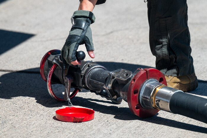 U.S. Air Force Capt. Matthew Brown, an F-35 assistant program manager assigned to the 59th Test and Evaluation Squadron, prepares an F-35 Lightning II to be refueled in support of independent pilot off-station procedures (IPOP) at Nellis Air Force Base, Nevada, April 1, 2024.