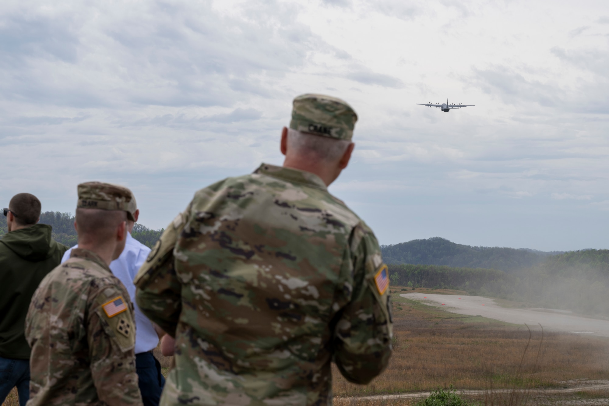 A U.S. Air Force C130J-30 assigned to the 130th Airlift Wing, West Virginia Air National Guard, takes off from an unpaved runway as Distinguished Visitors (DV) look on during Sentry Storm 24 DV Day, April 17, 2024, at Camp Branch, Logan County, W.Va. Sentry Storm is an exercise staged at McLaughlin ANGB in Charleston, Camp Branch in Logan County, Shepherd Field in Martinsburg and in the skies over West Virginia, involving an estimated 500 personnel from the state’s Air and Army National Guard, partnering National Guard units form Kentucky, North Carolina, and Michigan, as well as Civil Air Patrol units. (U.S. Air National Guard photo by 2nd Lt. De-Juan Haley)