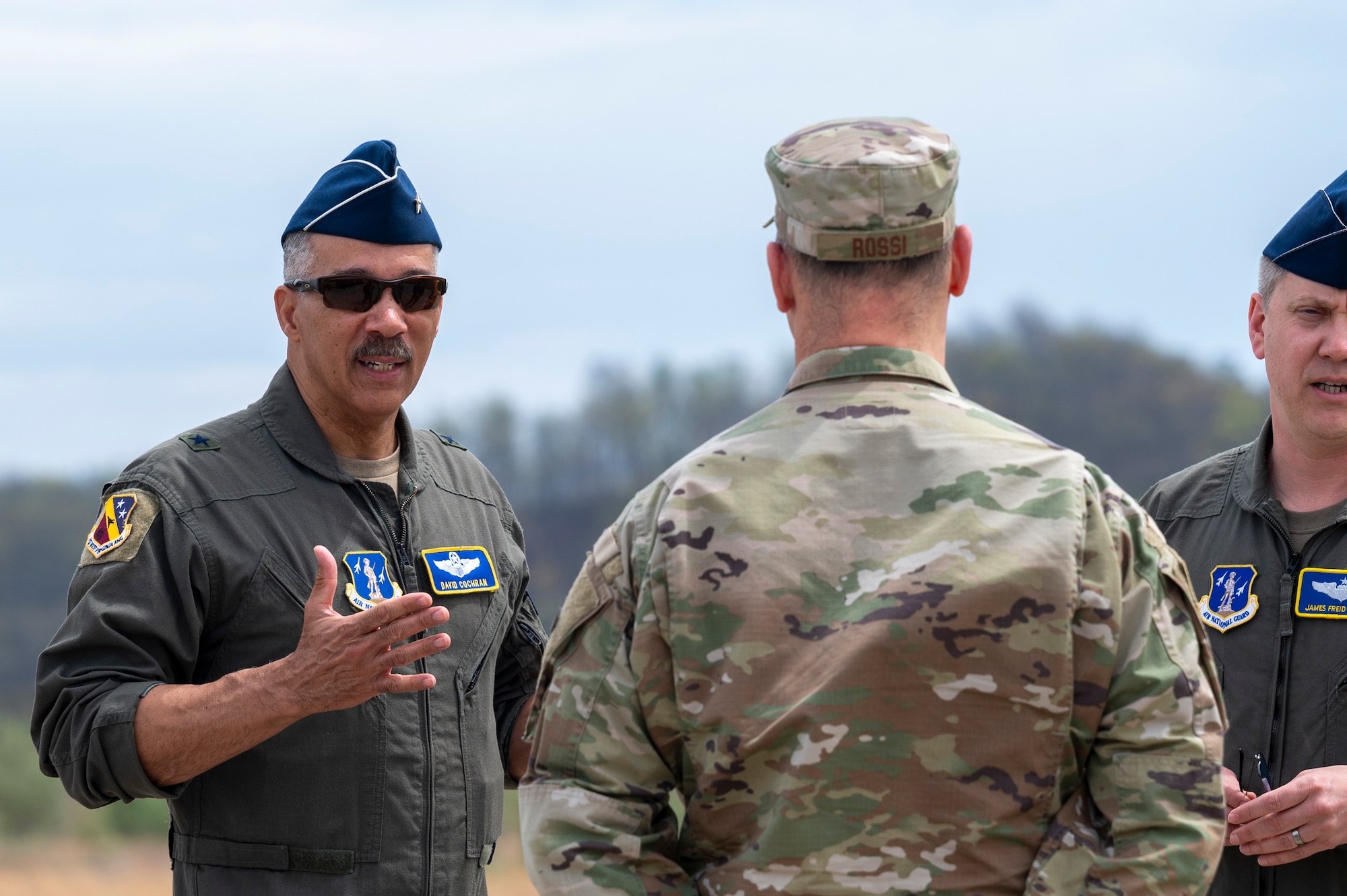.S. Air Force Brig. Gen. David Cochran, Adjutant General-Air, West Virginia National Guard talks with Col. James Rossi, Alpena CRTC Commander, Michigan Air National Guard during Sentry Storm 24 DV Day, April 17, 2024, at Camp Branch, Logan County, W.Va. Sentry Storm is an exercise staged at McLaughlin ANGB in Charleston, Camp Branch in Logan County, Shepherd Field in Martinsburg and the skies over West Virginia, involving an estimated 500 personnel from the state’s Air and Army National Guard, partnering National Guard units from Kentucky, North Carolina, and Michigan, as well as Civil Air Patrol units. (U.S. Air National Guard photo by 2nd Lt. De-Juan Haley)