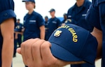 Company commanders present the senior recruit company with their Coast Guard Emblem at Coast Guard Training Center Cape May, N.J., July 29, 2013. The presentation of the Emblem signifies another step in the recruits' progress to earning the title "Coast Guardsman." (Coast Guard photo by Chief Warrant Officer Donnie Brzuska)