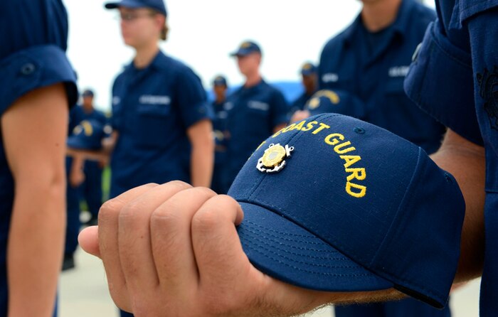 Company commanders present the senior recruit company with their Coast Guard Emblem at Coast Guard Training Center Cape May, N.J., July 29, 2013. The presentation of the Emblem signifies another step in the recruits' progress to earning the title "Coast Guardsman." (Coast Guard photo by Chief Warrant Officer Donnie Brzuska)