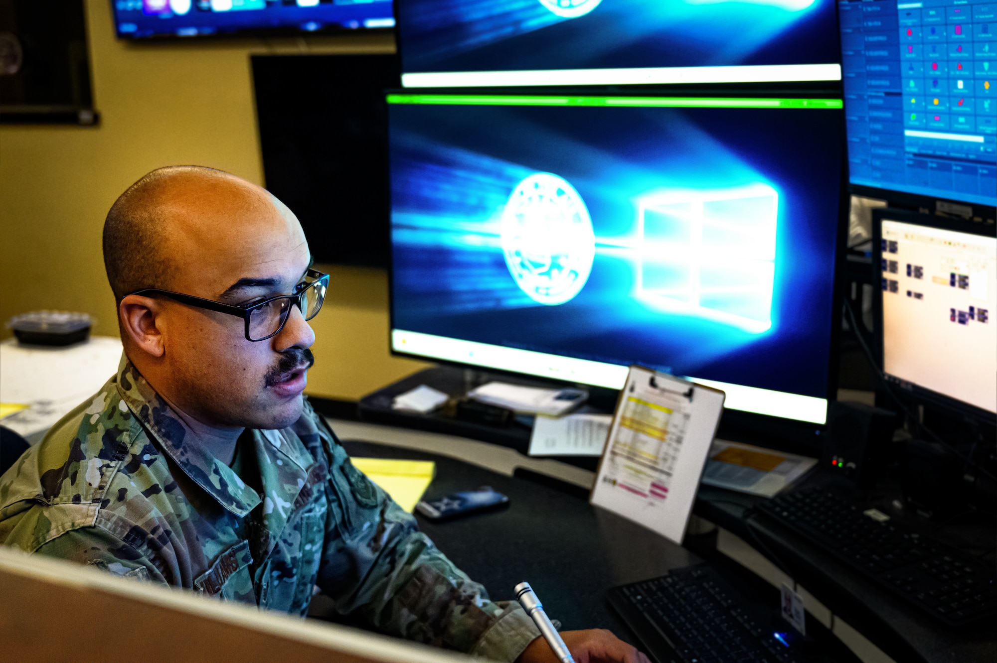 U.S. Air Force Staff Sgt. Tyler Williams, 87th Security Forces Squadron emergency dispatcher, documents an emergency 911 call at Joint Base McGuire-Dix-Lakehurst, N.J., April 16, 2024. National Public Safety Telecommunicators Week is observed each April to honor the dedication of first response emergency dispatchers for the critical service they provide. (U.S. Air Force photo by Senior Airman Matt Porter)