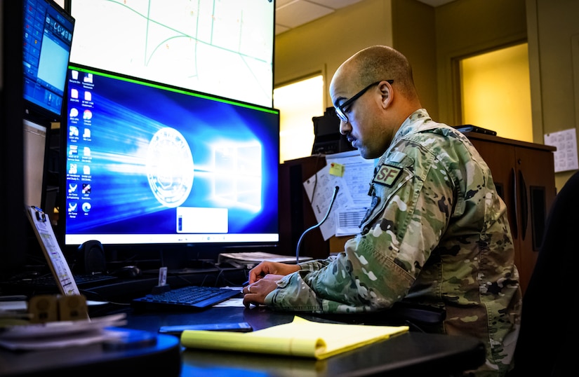U.S. Air Force Staff Sgt. Tyler Williams, 87th Security Forces Squadron emergency dispatcher, documents an emergency 911 call at Joint Base McGuire-Dix-Lakehurst, N.J., April 16, 2024. National Public Safety Telecommunicators Week is observed each April to honor the dedication of first response emergency dispatchers for the critical service they provide. (U.S. Air Force photo by Senior Airman Matt Porter)
