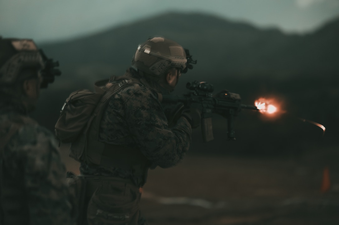 A U.S. Marine with 5th Air Naval Gunfire Liaison Company, III Marine Expeditionary Force Information Group, fires an M4 carbine during a Marine Corps Combat Marksmanship Program range as part of 2nd Brigade Platoon’s field exercise on Camp Hansen, Okinawa, Japan, Feb. 14, 2024. CMP allows Marines to maintain weapon proficiency by engaging targets in a competitive environment with primary and secondary weapon systems. 5th ANGLICO Marines refined their shooting fundamentals through advanced marksmanship training, enhancing their lethality. (U.S. Marine Corps photo by Staff Sgt. Manuel A. Serrano)