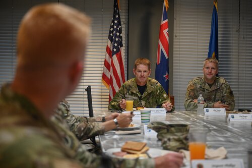 Royal New Zealand Air Force Warrant Officer of the Air Force Kerry Williams talks with Team Little Rock members at Little Rock Air Force Base, Arkansas, April 16, 2024. Williams visited the RNZAF troops at Little Rock AFB to inform about new policies, procedures and events happening in New Zealand. (U.S. Air Force photo by Airman 1st Class Saisha Cornett)