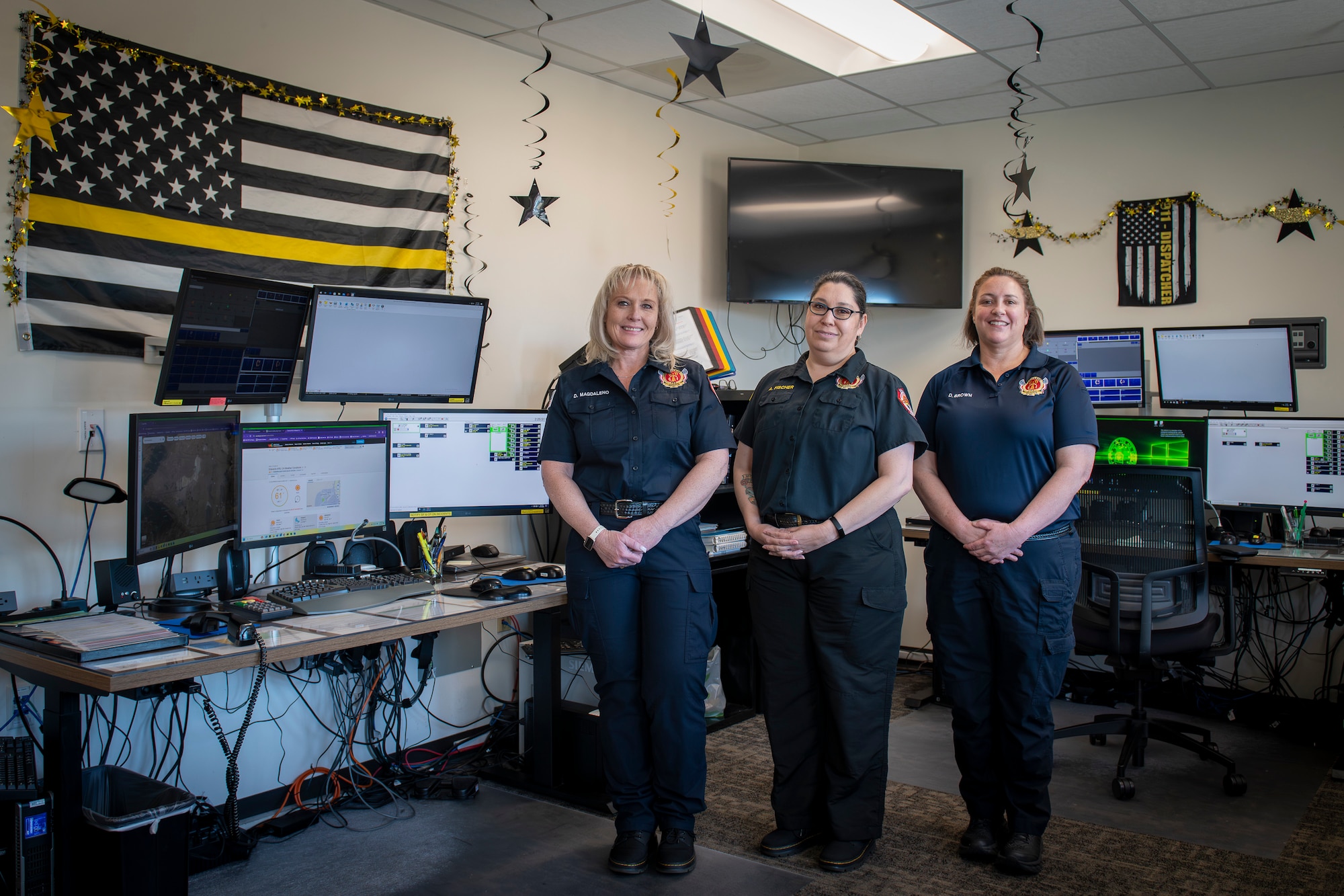 812th Civil Engineer Squadron emergency dispatchers were honored during National Public Safety Telecommunicators Week, April 14-20. Dispatchers play a vital role as liaison between emergency crews and callers, relaying potentially life-saving information. (Air Force photo by Giancarlo Casem)