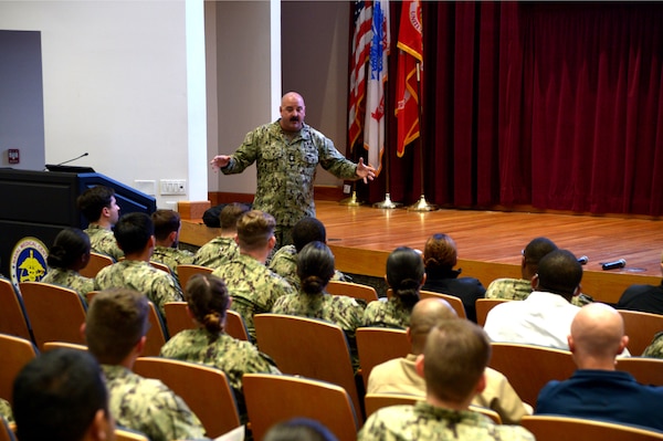 U.S. Navy Master Chief Hospital Corpsman Christian Flohr, a Senior Enlisted Medical Advisor, talks with Sailors during a Navy Enlisted Classifications roadshow at Naval Medical Center San Diego, Apr. 18, 2024. The NEC roadshow focuses on giving Sailors the knowledge and tools to pursue opportunities within their rate to include Dive Medicine and other specialized assignments.  NMCSD continuously seeks professional civilian talent, not just limited to health care providers and administrative support. For anyone seeking a federal job, visit USAJobs at usajobs.gov - the Federal Government's official employment site.  The mission of NMCSD is to prepare service members to deploy in support of operational forces, deliver high quality health care services, and shape the future of military medicine through education, training, and research. NMCSD employs more than 5,000 active-duty military personnel, civilians and contractors in southern California to provide patients with world-class care. Anchored in Excellence, Committed to Health! (U.S. Navy photo by Mass Communication Specialist 2nd Class Jacob Woitzel)