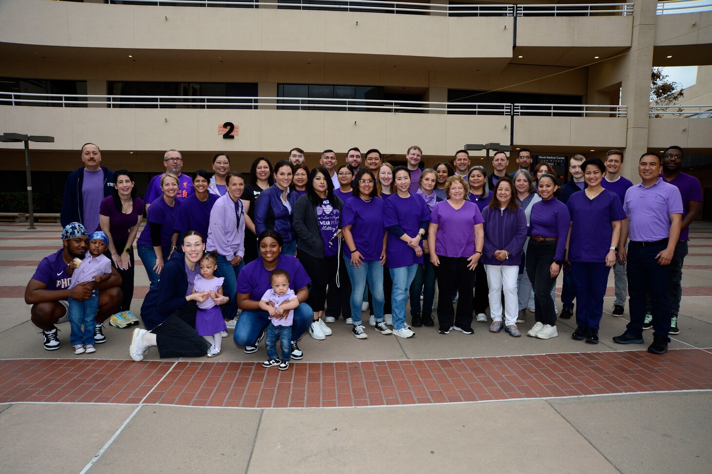 The Pediatrics department at Naval Medical Center San Diego wear purple to celebrate Month of the Military Child at hospital, April 18, 2024. NMCSD continuously seeks professional civilian talent, not just limited to health care providers and administrative support. For anyone seeking a federal job, visit USAJobs at usajobs.gov - the Federal Government's official employment site.  The mission of NMCSD is to prepare service members to deploy in support of operational forces, deliver high quality health care services, and shape the future of military medicine through education, training, and research. NMCSD employs more than 5,000 active-duty military personnel, civilians and contractors in southern California to provide patients with world-class care. Anchored in Excellence, Committed to Health! (U.S. Navy photo by Mass Communication Specialist 2nd Class Celia Martin)