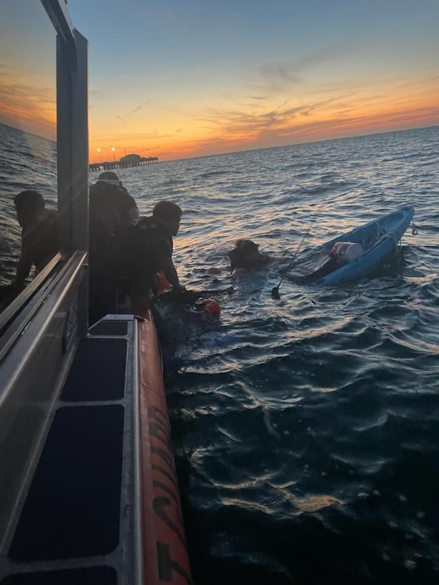 A Coast Guard Station Cortez boat crew rescued two people after their kayak flipped within the vicinity of the Sunshine Skyway Bridge, April 20, 2024. Station Cortez watchstanders were notified around 8 p.m., through a 911-connected mobile app, that Manatee and Pinellas County Sheriff’s Office boat crews were responding to kayakers in distress. (U.S. Coast Guard photo)
