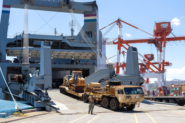 A military vehicle is driven out of Military Sealift Command chartered ship MV Cape Horn (T-AKR 5068) during an offload for exercise Balikatan 2024 at the New Container Terminal, Subic Bay, Philippines, April 15. Balikatan is a longstanding annual exercise between the Armed Forces of the Philippines and the U.S. military designed to strengthen bilateral capabilities, interoperability, trust, and cooperation. (U.S. Navy photo by Grady T. Fontana)