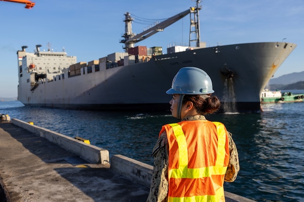 Information System Technician 2nd Class Charieann G. Cabahit, a Reservists with Military Sealift Command Expeditionary Port Unit Pearl Harbor, Hawaii, prepares for the arrival of MSC chartered ship MV Cape Horn (T-AKR 5068) at the New Container Terminal, Subic Bay, Philippines, before an offload of equipment in support of exercise Balikatan 2024, April 15. Balikatan is a longstanding annual exercise between the Armed Forces of the Philippines and U.S. military designed to strengthen bilateral capabilities, interoperability, trust, and cooperation. (U.S. Navy photo by Grady T. Fontana)