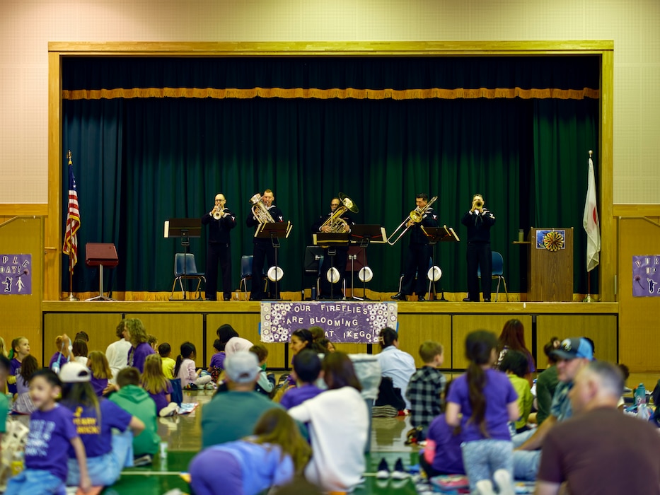 Ikego Elementary School held the Second Annual Month of the Military Child Picnic April 19, 2024 in the school's cafeteria. The indoor picnic is an opportunity for Ikego Elementary's military-connected children to eat lunch with their family while enjoying live music performed by the 7th Fleet Band's Shonan Brass Quintet.
