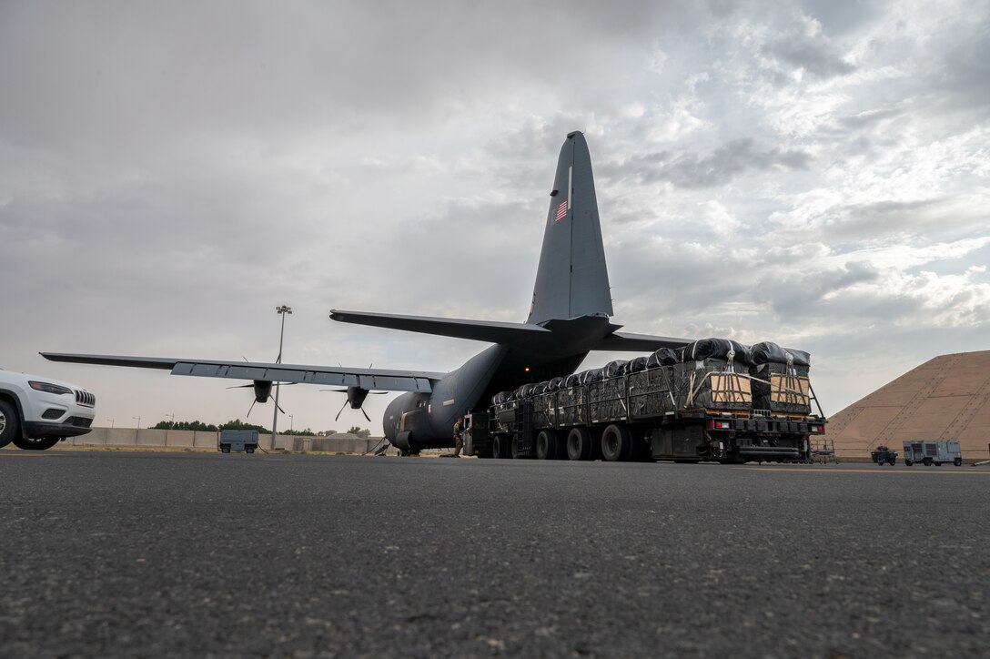 Bundles of humanitarian aid destined for Gaza are loaded onto a U.S. Air Force C-130J Super Hercules at an undisclosed location within the U.S. Central Command area of responsibility, April 21, 2024. The U.S. Air Force’s rapid global mobility capability is enabling the expedited movement of critical, life-saving supplies to Gaza. (U.S. Air Force photo)
