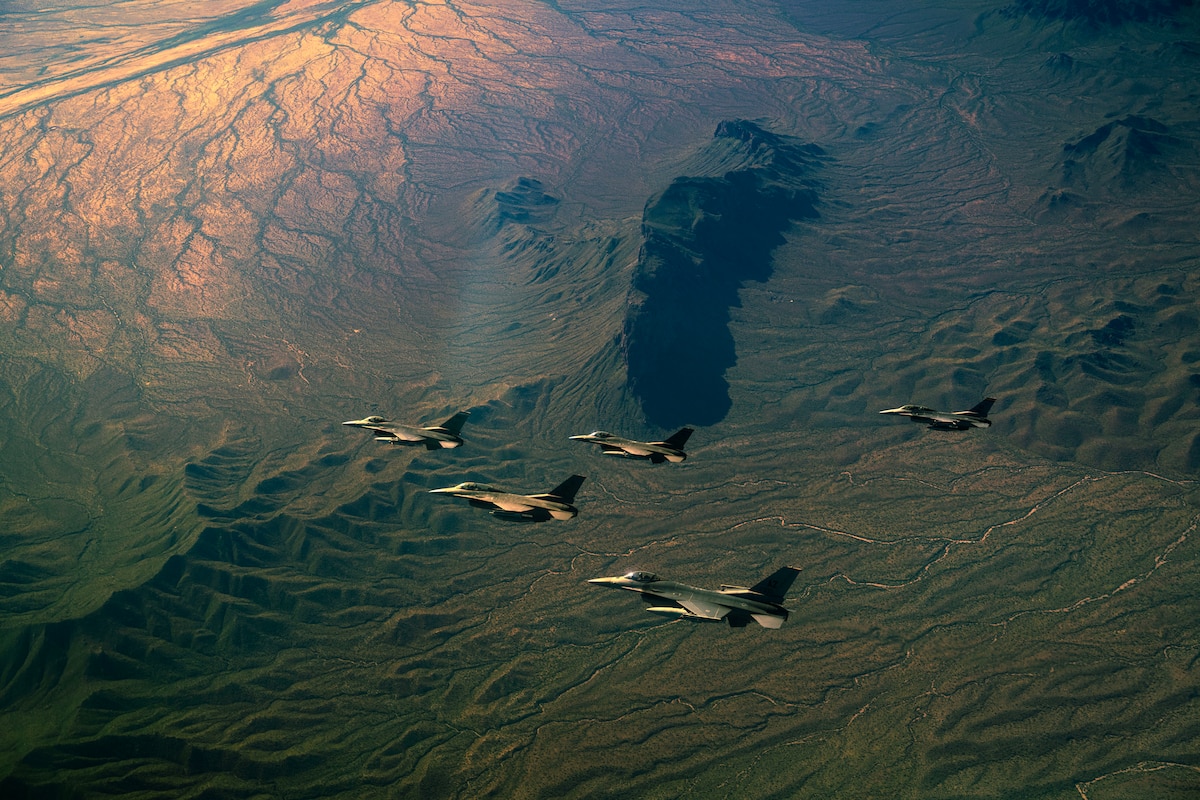 Five F-16 Fighting Falcons assigned to the 162nd Wing, Morris Air National Guard Base, Tucson, Ariz., fly in formation over southern Arizona, April 6, 2024. The 162nd Wing’s F-16 fighter training program instructs, develops and prepares U.S. and allied pilots to operate the highly maneuverable, high-performance fighter aircraft. (U.S. Air Force photo by Staff Sgt. Colin Hollowell)