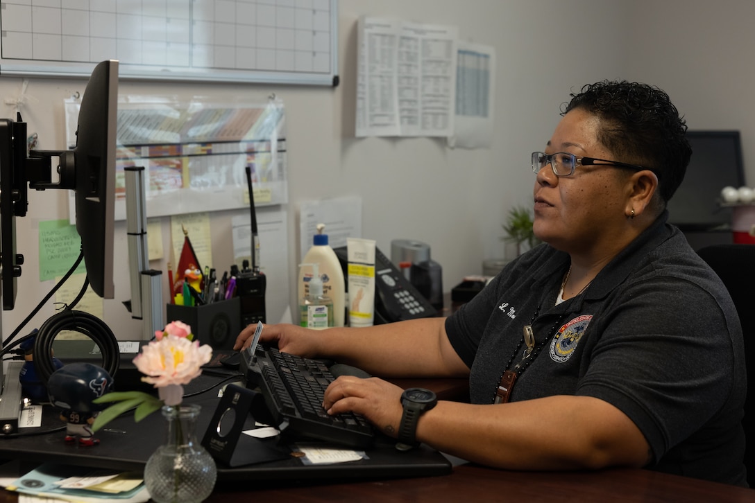 Lisa Moran, supervisory 911 dispatcher, Security Emergency Services, takes a call on Marine Corps Base Camp Lejeune, North Carolina, April 9, 2024. During the month of April, National Public Safety Telecommunicators Week is held to honor personnel in the public safety sector for their dedicated service to the community. (U.S. Marine Corps photo by Cpl. Jennifer E. Douds)