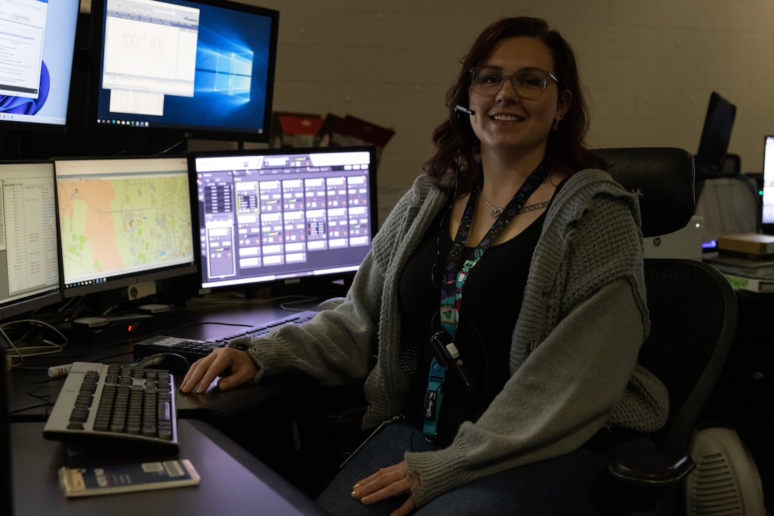Kaitlin Johnson, 911 dispatcher, Security Emergency Services, poses for a photo during National Public Safety Telecommunicator Week on Marine Corps Base Camp Lejeune, North Carolina, April 9, 2024. During the month of April, National Public Safety Telecommunicators Week is held to honor personnel in the public safety sector for their dedicated service to the community. (U.S. Marine Corps photo by Cpl. Jennifer E. Douds)