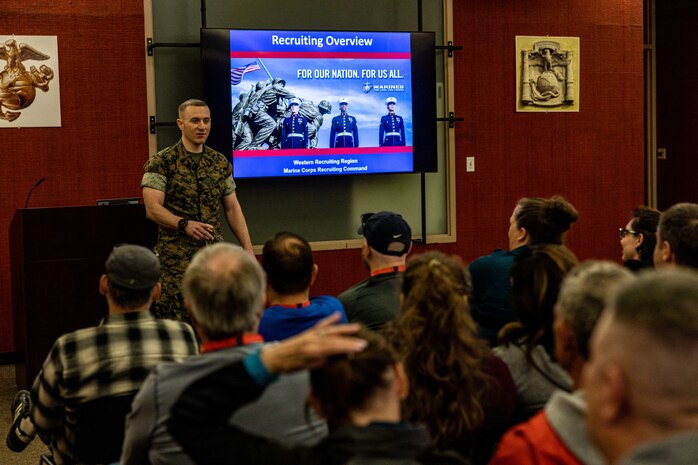 U.S. Marine Corps Master Sgt. Thomas Hughes, an assistant operations chief with Headquarters and Service Battalion, Marine Corps Recruit Depot San Diego, gives a recruiting brief to educators from Recruiting Stations Portland, Riverside, San Francisco, and Seattle as part of the 2024 Educator’s Workshop at MCRD San Diego, California, April 16, 2024. Participants of the workshop visit MCRD San Diego to observe recruit training and gain a better understanding about the transformation from recruits to United States Marines. Educators also received classes and briefs on the benefits that are provided to service members serving in the United States armed forces. (U.S. Marine Corps photo by Sgt. Jesse K. Carter-Powell)