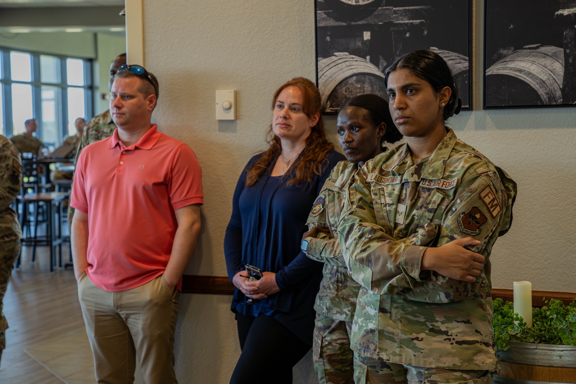U.S. Airmen and civilians listen to different ideas pitched to the Dragon Tank panel at Keesler Air Force Base, Mississippi, April 3, 2024.