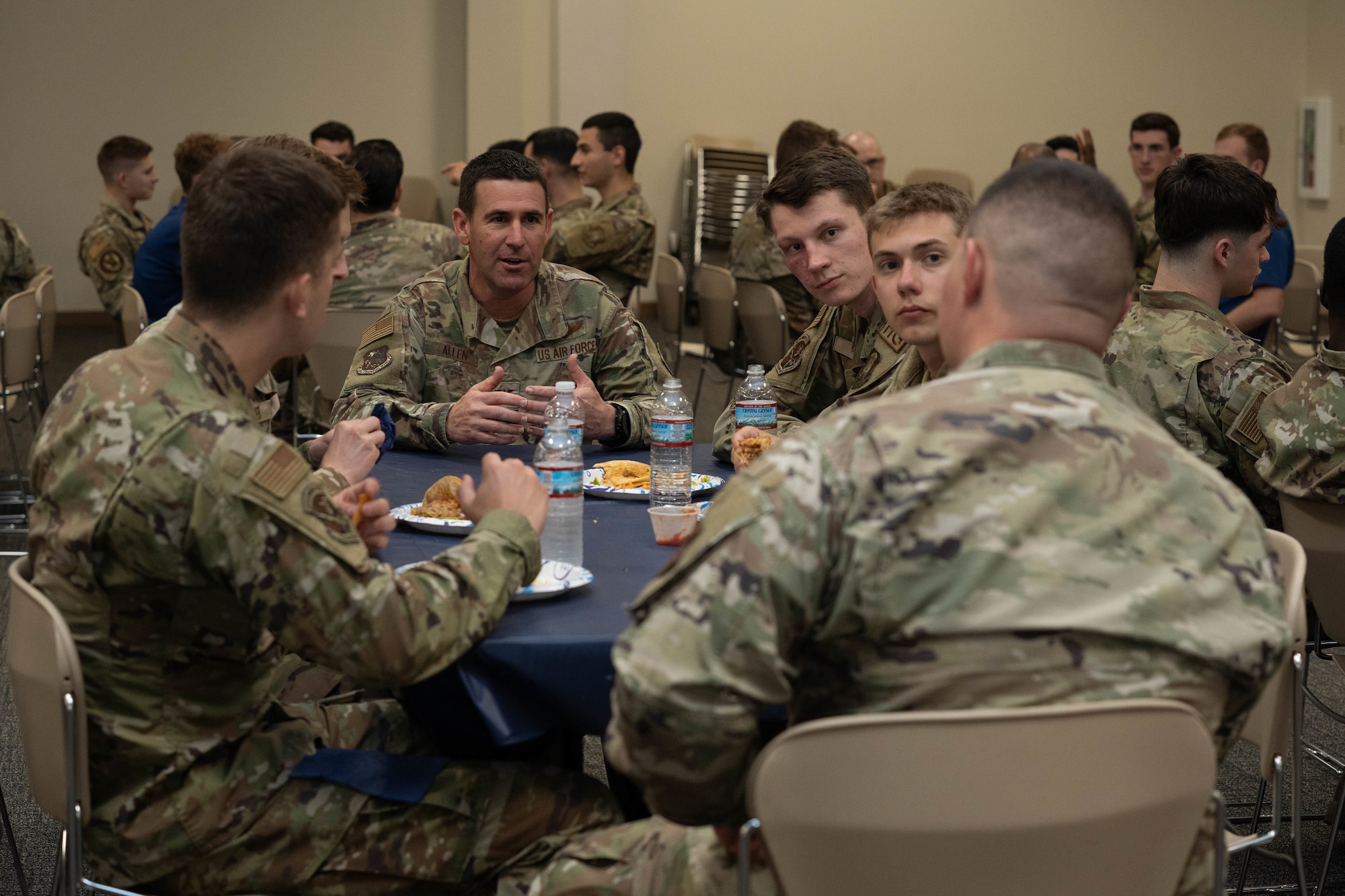 U.S. Air Force Col. Jason Allen, 81st Training Wing deputy commander, talks to a table of students about his experiences as a commander during a Pathways to Blue mentorship dinner on Keesler Air Force Base, Mississippi, March 22, 2024.