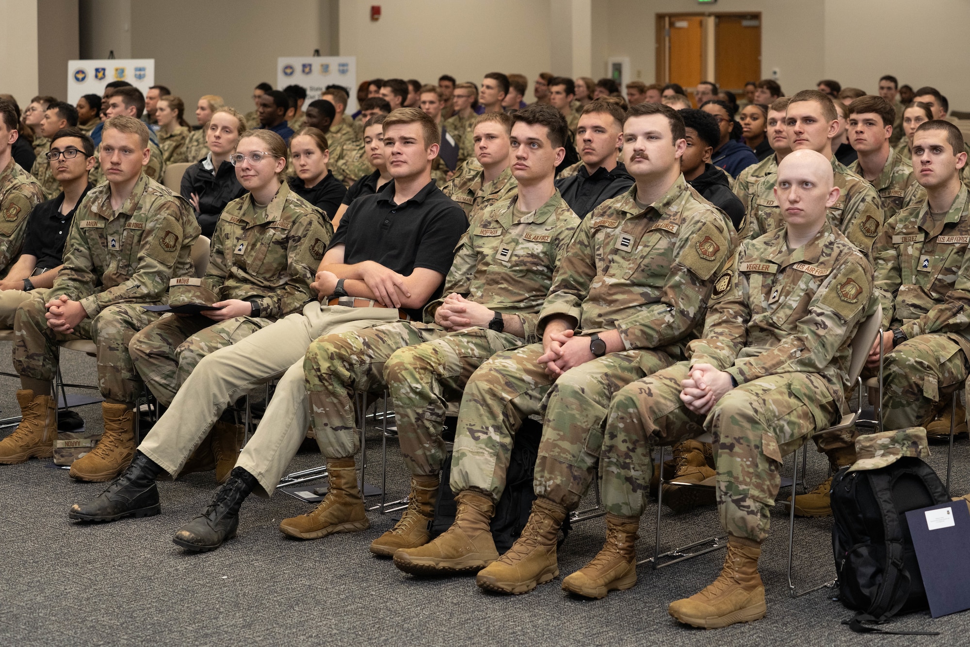U.S. Air Force ROTC cadets watch a video showcasing different career fields at Pathways to Blue on Keesler Air Force Base, Mississippi, March 22, 2024.