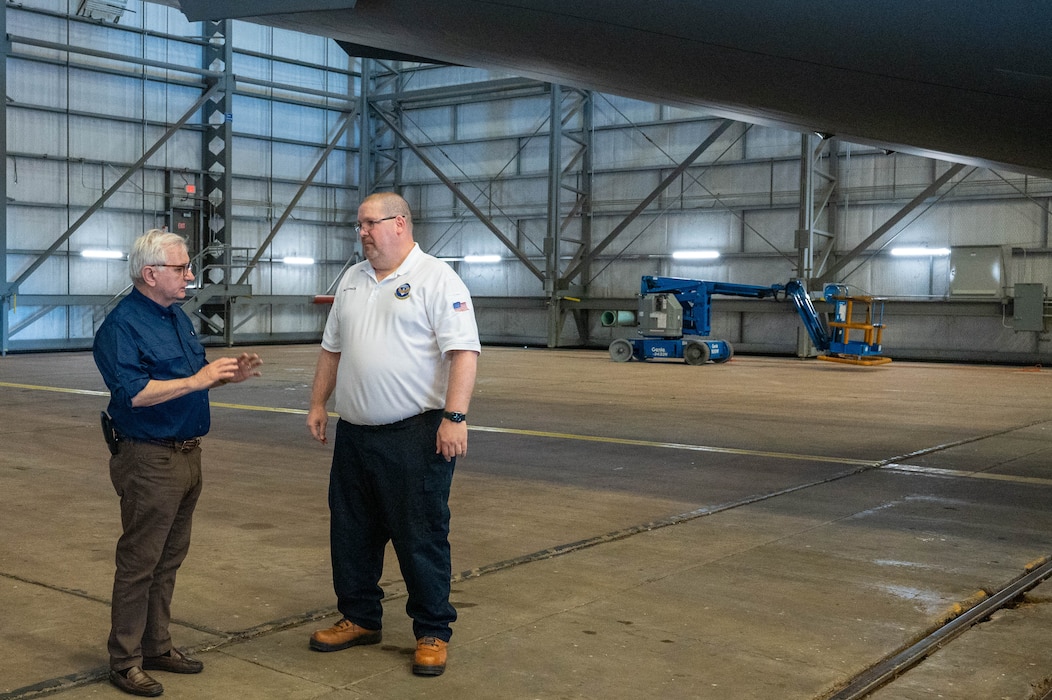 From left, U.S. Sen. Jack Reed, speaks with Jeff Gobeille, 97th Maintenance Squadron Maintenance Flight superintendent, underneath the wing of a KC-46 Pegasus during a visit at Altus Air Force Base, Oklahoma, April 12, 2024. Reed learned about the current staffing and maintenance needs of the maintenance squadron. (U.S. Air Force photo by Airman 1st Class Heidi Bucins)